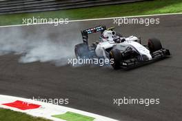 Valtteri Bottas (FIN) Williams FW36 locks up under braking. 05.09.2014. Formula 1 World Championship, Rd 13, Italian Grand Prix, Monza, Italy, Practice Day.