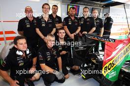 Sahara Force India F1 Team mechanics pay tribute to friend and former colleague Gary North, who was better known in the paddock as 'Gadget'. 05.09.2014. Formula 1 World Championship, Rd 13, Italian Grand Prix, Monza, Italy, Practice Day.