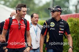 (L to R): Jules Bianchi (FRA) Marussia F1 Team with Pastor Maldonado (VEN) Lotus F1 Team. 05.09.2014. Formula 1 World Championship, Rd 13, Italian Grand Prix, Monza, Italy, Practice Day.