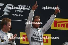 Nico Rosberg (GER) Mercedes AMG F1 and Lewis Hamilton (GBR) Mercedes AMG F1. 07.09.2014. Formula 1 World Championship, Rd 13, Italian Grand Prix, Monza, Italy, Race Day.