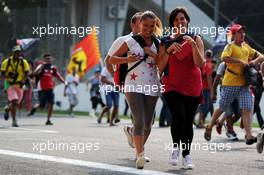 Fans invade the podium at the end of the race. 07.09.2014. Formula 1 World Championship, Rd 13, Italian Grand Prix, Monza, Italy, Race Day.