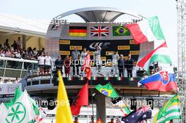 The podium (L to R): Nico Rosberg (GER) Mercedes AMG F1, second; Lewis Hamilton (GBR) Mercedes AMG F1, race winner; Felipe Massa (BRA) Williams, third. 07.09.2014. Formula 1 World Championship, Rd 13, Italian Grand Prix, Monza, Italy, Race Day.