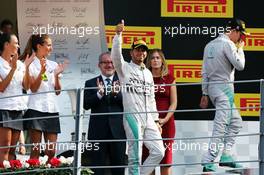 Race winner Lewis Hamilton (GBR) Mercedes AMG F1 celebrates on the podium. 07.09.2014. Formula 1 World Championship, Rd 13, Italian Grand Prix, Monza, Italy, Race Day.