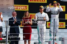 Race winner Lewis Hamilton (GBR) Mercedes AMG F1 celebrates on the podium. 07.09.2014. Formula 1 World Championship, Rd 13, Italian Grand Prix, Monza, Italy, Race Day.