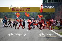 Fans invade the podium at the end of the race. 07.09.2014. Formula 1 World Championship, Rd 13, Italian Grand Prix, Monza, Italy, Race Day.