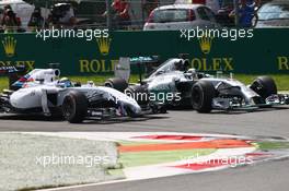 Felipe Massa (BRA) Williams FW36 and Lewis Hamilton (GBR) Mercedes AMG F1 W05. 07.09.2014. Formula 1 World Championship, Rd 13, Italian Grand Prix, Monza, Italy, Race Day.