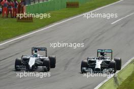 (L to R): Felipe Massa (BRA) Williams FW36 and Lewis Hamilton (GBR) Mercedes AMG F1 W05 battle for position. 07.09.2014. Formula 1 World Championship, Rd 13, Italian Grand Prix, Monza, Italy, Race Day.