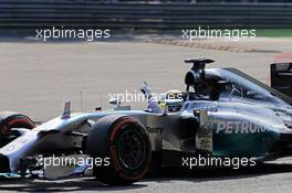 Race winner Lewis Hamilton (GBR) Mercedes AMG F1 W05 celebrates at the end of the race. 07.09.2014. Formula 1 World Championship, Rd 13, Italian Grand Prix, Monza, Italy, Race Day.