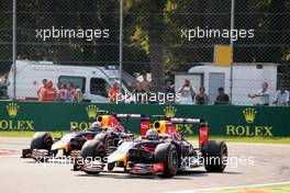 Sebastian Vettel (GER) Red Bull Racing RB10 leads team mate Daniel Ricciardo (AUS) Red Bull Racing RB10. 07.09.2014. Formula 1 World Championship, Rd 13, Italian Grand Prix, Monza, Italy, Race Day.