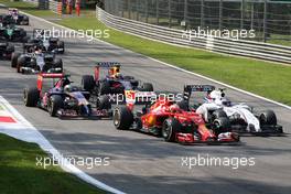 Kimi Raikkonen (FIN), Scuderia Ferrari and Valtteri Bottas (FIN), Williams F1 Team  07.09.2014. Formula 1 World Championship, Rd 13, Italian Grand Prix, Monza, Italy, Race Day.