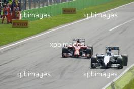 Valtteri Bottas (FIN) Williams FW36 leads Kimi Raikkonen (FIN) Ferrari F14-T. 07.09.2014. Formula 1 World Championship, Rd 13, Italian Grand Prix, Monza, Italy, Race Day.