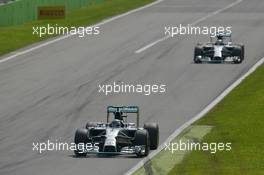 Nico Rosberg (GER) Mercedes AMG F1 W05 leads team mate Nico Rosberg (GER) Mercedes AMG F1 W05. 07.09.2014. Formula 1 World Championship, Rd 13, Italian Grand Prix, Monza, Italy, Race Day.