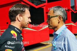 (L to R): Christian Horner (GBR) Red Bull Racing Team Principal with Hiroshi Yasukawa (JPN) Dorna Sports Adviser. 06.09.2014. Formula 1 World Championship, Rd 13, Italian Grand Prix, Monza, Italy, Qualifying Day.