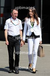 Paddy Lowe (GBR) Mercedes AMG F1 Executive Director (Technical) with his wife Anna Danshina. 06.09.2014. Formula 1 World Championship, Rd 13, Italian Grand Prix, Monza, Italy, Qualifying Day.