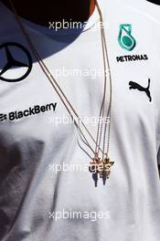 Lewis Hamilton (GBR) Mercedes AMG F1 jewellry. 06.09.2014. Formula 1 World Championship, Rd 13, Italian Grand Prix, Monza, Italy, Qualifying Day.