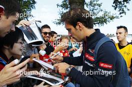 Jean-Eric Vergne (FRA) Scuderia Toro Rosso signs autographs for the fans. 06.09.2014. Formula 1 World Championship, Rd 13, Italian Grand Prix, Monza, Italy, Qualifying Day.
