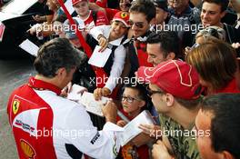 Marco Mattiacci (ITA) Ferrari Team Principal signs autographs for the fans. 06.09.2014. Formula 1 World Championship, Rd 13, Italian Grand Prix, Monza, Italy, Qualifying Day.