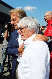 Bernie Ecclestone (GBR) with Luca di Montezemolo (ITA) Ferrari President. 06.09.2014. Formula 1 World Championship, Rd 13, Italian Grand Prix, Monza, Italy, Qualifying Day.