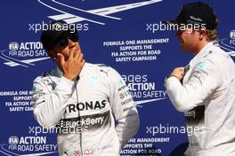 (L to R): Pole sitter Lewis Hamilton (GBR) Mercedes AMG F1 in parc ferme with team mate Nico Rosberg (GER) Mercedes AMG F1. 06.09.2014. Formula 1 World Championship, Rd 13, Italian Grand Prix, Monza, Italy, Qualifying Day.