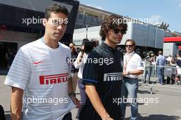 (L to R): Hernanes (BRA) with Dodo (BRA) Inter Milan Football Players. 06.09.2014. Formula 1 World Championship, Rd 13, Italian Grand Prix, Monza, Italy, Qualifying Day.