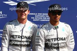 Nico Rosberg (GER) Mercedes AMG F1 W05 and Lewis Hamilton (GBR) Mercedes AMG F1. 06.09.2014. Formula 1 World Championship, Rd 13, Italian Grand Prix, Monza, Italy, Qualifying Day.