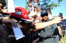 Lewis Hamilton (GBR) Mercedes AMG F1 signs autographs for the fans. 06.09.2014. Formula 1 World Championship, Rd 13, Italian Grand Prix, Monza, Italy, Qualifying Day.