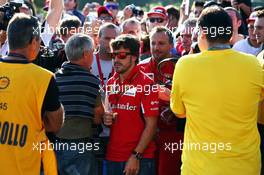 Fernando Alonso (ESP) Ferrari with fans. 06.09.2014. Formula 1 World Championship, Rd 13, Italian Grand Prix, Monza, Italy, Qualifying Day.
