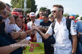 Giedo van der Garde (NLD) Sauber Reserve Driver signs autographs for the fans. 07.09.2014. Formula 1 World Championship, Rd 13, Italian Grand Prix, Monza, Italy, Race Day.
