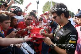 Sergio Perez (MEX) Sahara Force India F1 signs autographs for the fans. 07.09.2014. Formula 1 World Championship, Rd 13, Italian Grand Prix, Monza, Italy, Race Day.