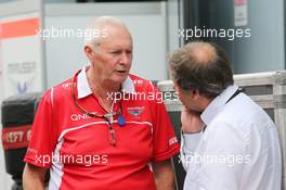 (L to R): John Booth (GBR) Marussia F1 Team Team Principal with Gerhard Ungar (GER) Caterham F1 Team. 04.09.2014. Formula 1 World Championship, Rd 13, Italian Grand Prix, Monza, Italy, Preparation Day.