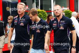 Sebastian Vettel (GER) Red Bull Racing with Jonathan Wheatley (GBR) Red Bull Racing Team Manager (Left). 04.09.2014. Formula 1 World Championship, Rd 13, Italian Grand Prix, Monza, Italy, Preparation Day.