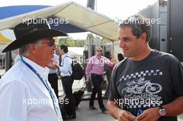 (L to R): Mario Andretti (USA) with Juan Pablo Montoya (COL). 04.09.2014. Formula 1 World Championship, Rd 13, Italian Grand Prix, Monza, Italy, Preparation Day.