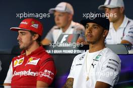 (L to R): Fernando Alonso (ESP) Ferrari and Lewis Hamilton (GBR) Mercedes AMG F1 in the FIA Press Conference. 04.09.2014. Formula 1 World Championship, Rd 13, Italian Grand Prix, Monza, Italy, Preparation Day.