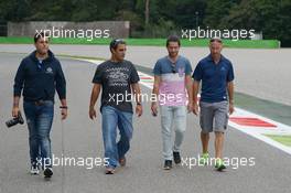 Juan Pablo Montoya (COL) walks the circuit. 04.09.2014. Formula 1 World Championship, Rd 13, Italian Grand Prix, Monza, Italy, Preparation Day.