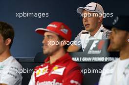 Kevin Magnussen (DEN) McLaren in the FIA Press Conference. 04.09.2014. Formula 1 World Championship, Rd 13, Italian Grand Prix, Monza, Italy, Preparation Day.