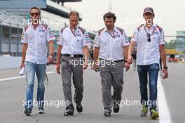 Giedo van der Garde (NLD) Sauber Reserve Driver (Left) and Adrian Sutil (GER) Sauber (Right) walk the circuit. 04.09.2014. Formula 1 World Championship, Rd 13, Italian Grand Prix, Monza, Italy, Preparation Day.