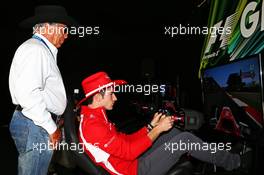 Alexander Rossi (USA) Marussia F1 Team Reserve Driver with Mario Andretti (USA) Circuit of The Americas' Official Ambassador. 04.09.2014. Formula 1 World Championship, Rd 13, Italian Grand Prix, Monza, Italy, Preparation Day.