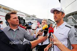 Jenson Button (GBR) McLaren with the media. 04.09.2014. Formula 1 World Championship, Rd 13, Italian Grand Prix, Monza, Italy, Preparation Day.
