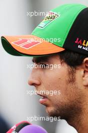 Sergio Perez (MEX) Sahara Force India F1 with the media. 04.09.2014. Formula 1 World Championship, Rd 13, Italian Grand Prix, Monza, Italy, Preparation Day.