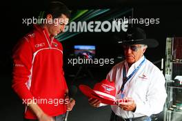 Alexander Rossi (USA) Marussia F1 Team Reserve Driver with Mario Andretti (USA) Circuit of The Americas' Official Ambassador. 04.09.2014. Formula 1 World Championship, Rd 13, Italian Grand Prix, Monza, Italy, Preparation Day.