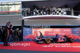 (L to R): Jean-Eric Vergne (FRA) Scuderia Toro Rosso with team mate Daniil Kvyat (RUS) Scuderia Toro Rosso at the unveiling of the Scuderia Toro Rosso STR9. 27.01.2014. Formula One Testing, Preparations, Jerez, Spain.