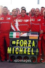 The Ferrari team show their support for Michael Schumacher (GER). 27.01.2014. Formula One Testing, Preparations, Jerez, Spain.