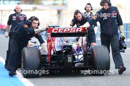 The Scuderia Toro Rosso STR9 of Jean-Eric Vergne (FRA) Scuderia Toro Rosso is pushed down the pit lane. 30.01.2014. Formula One Testing, Day Three, Jerez, Spain.