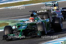 Robin Frijns (NLD) Caterham CT05 Test and Reserve Driver leads Lewis Hamilton (GBR) Mercedes AMG F1 W05. 30.01.2014. Formula One Testing, Day Three, Jerez, Spain.