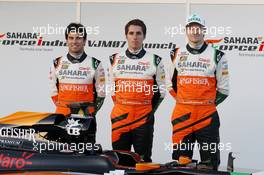 (L to R): Sergio Perez (MEX) Sahara Force India F1; Daniel Juncadella (ESP) Sahara Force India F1 Team Test and Reserve Driver; and Nico Hulkenberg (GER) Sahara Force India F1 at the launch of the new Sahara Force India F1 VJM07.  28.01.2014. Formula One Testing, Day One, Jerez, Spain.