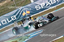 Lewis Hamilton (GBR) Mercedes AMG F1 W05 locks up under braking. 28.01.2014. Formula One Testing, Day One, Jerez, Spain.