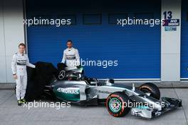 (L to R): Nico Rosberg (GER) Mercedes AMG F1 and team mate Lewis Hamilton (GBR) Mercedes AMG F1 unveil the new Mercedes AMG F1 W05. 28.01.2014. Formula One Testing, Day One, Jerez, Spain.