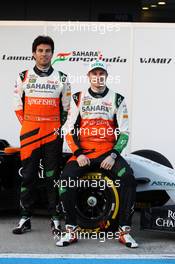 (L to R): Sergio Perez (MEX) Sahara Force India F1 and Nico Hulkenberg (GER) Sahara Force India F1 at the launch of the new Sahara Force India F1 VJM07.  28.01.2014. Formula One Testing, Day One, Jerez, Spain.
