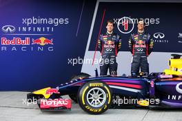 (L to R): Sebastian Vettel (GER) Red Bull Racing and team mate Daniel Ricciardo (AUS) Red Bull Racing at the unveiling of the Red Bull Racing RB10. 28.01.2014. Formula One Testing, Day One, Jerez, Spain.