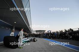 (L to R): Lewis Hamilton (GBR) Mercedes AMG F1 and team mate Nico Rosberg (GER) Mercedes AMG F1 unveil the new Mercedes AMG F1 W05. 28.01.2014. Formula One Testing, Day One, Jerez, Spain.